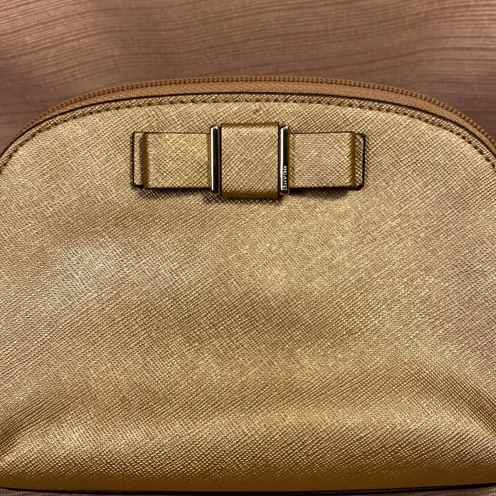 Coach gold metallic color cosmetic pouch w/elegant bow